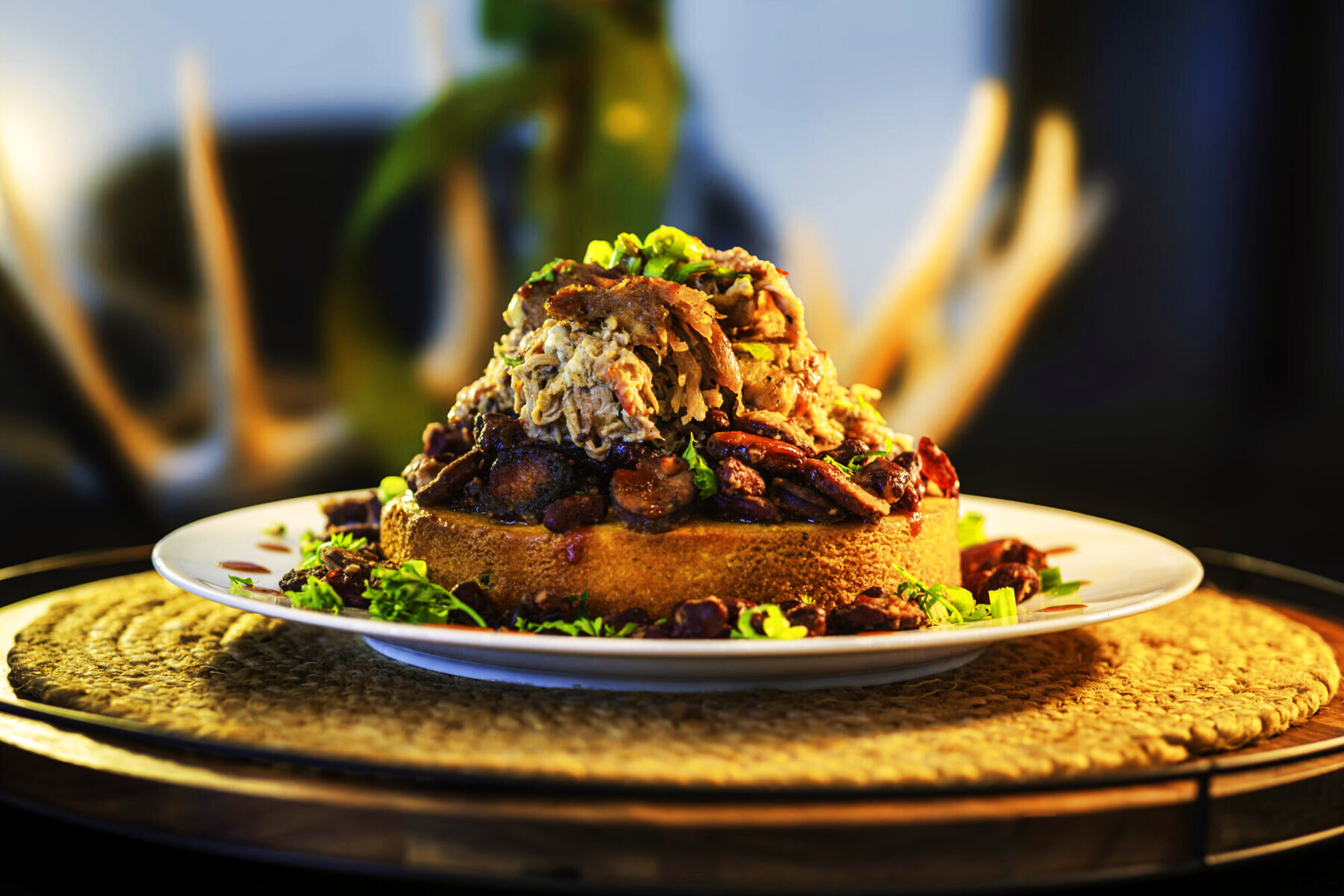 Plated rack of wild game on a Dry Creek-branded plate