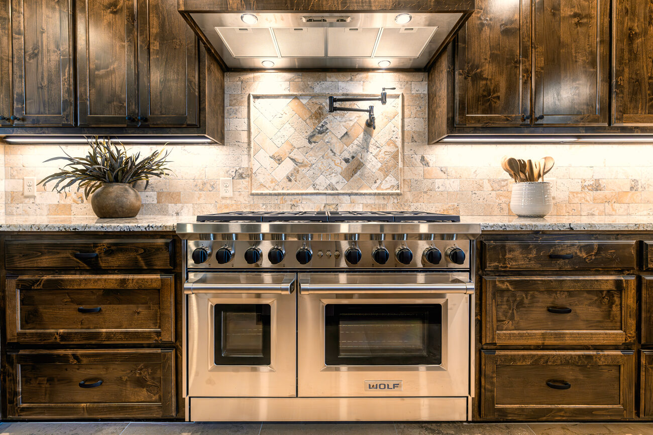 The full kitchen with range and island